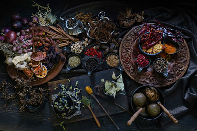 A variety spices and herbs in wooden bowls, of asians for cooking thai seasonings and herbs