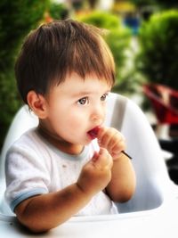 Portrait of cute boy looking away