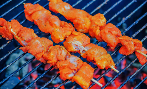 Close-up of meat on grill