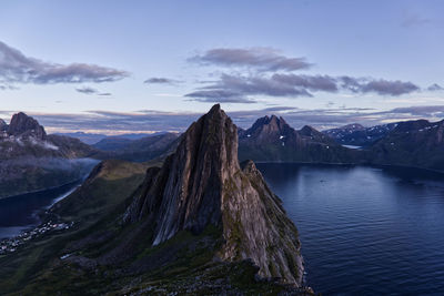 Panoramic view of a fjord and mountains against sky