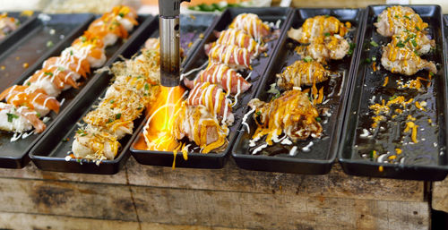High angle view of meat on barbecue grill