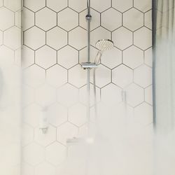 Shower head and with steam in bathroom