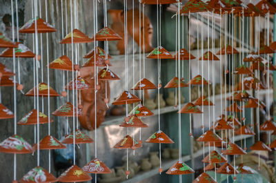 Close-up of toys for sale at market stall