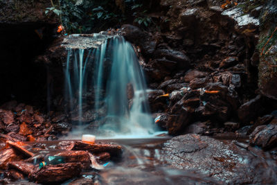 View of waterfall in forest