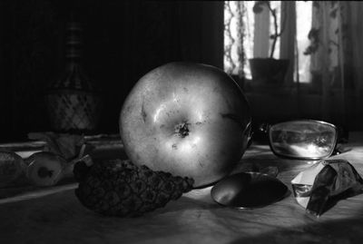 Close-up of apple on table at home