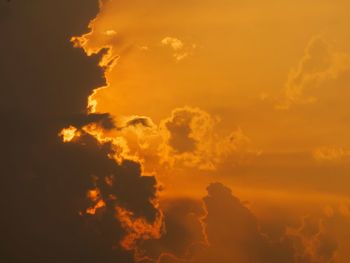 Low angle view of dramatic sky during sunset