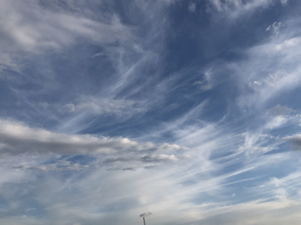 LOW ANGLE VIEW OF CLOUDS IN BLUE SKY