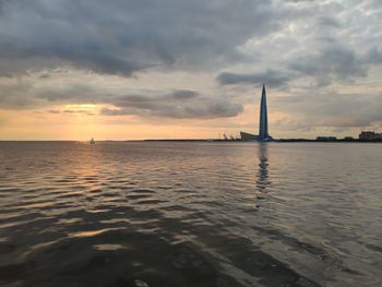 Scenic view of sea against sky during sunset