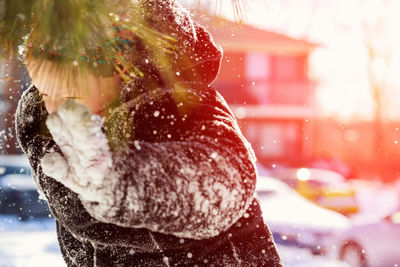 Girl gesturing in snow