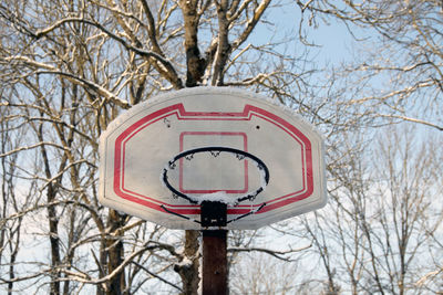 Low angle view of basketball hoop against sky