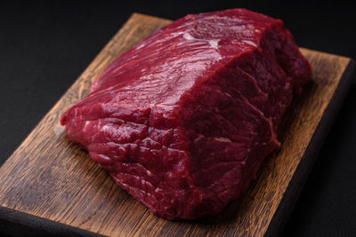 Close-up of meat on cutting board