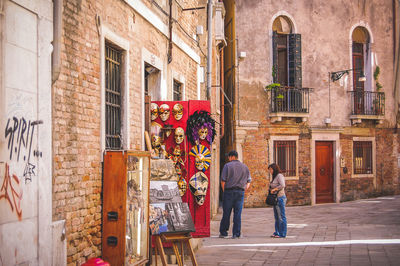 Woman standing in front of building