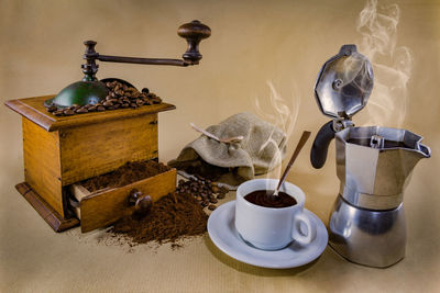 Close-up of coffee cup on table