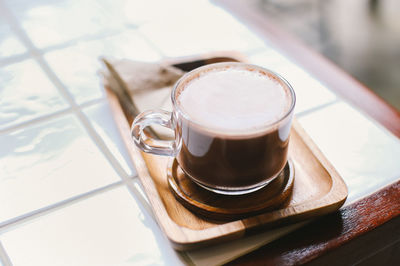 High angle view of coffee cup on table