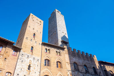 Ancient buildings on the main square of the city of san gimignano, tuscany