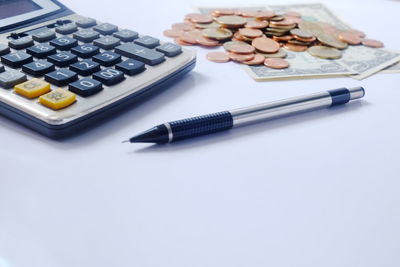 High angle view of coins on table