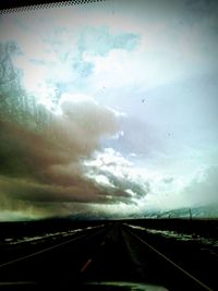 Road seen through car windshield