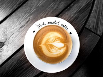 High angle view of cappuccino on table