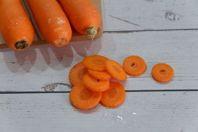 High angle view of orange fruits on table