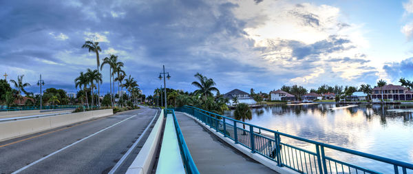 Dark clouds over herbert r. savage bridge, over savage pass, at the entrance of marco island, naples