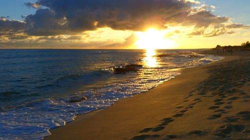 Scenic view of sea at sunset