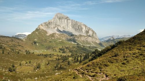 Scenic view of rocky mountains against sky