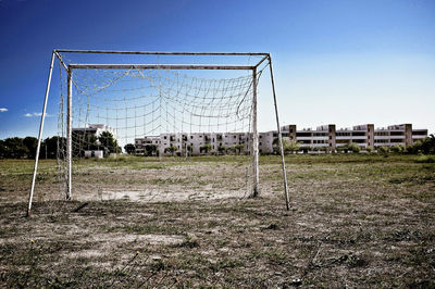 Soccer field against clear sky