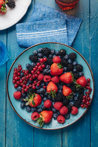 High angle view of strawberries on table