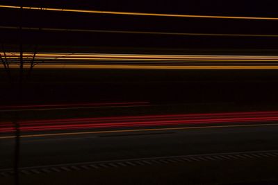 Light trails on road at night