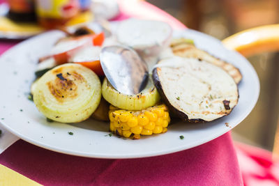 Close-up of fruits in plate on table