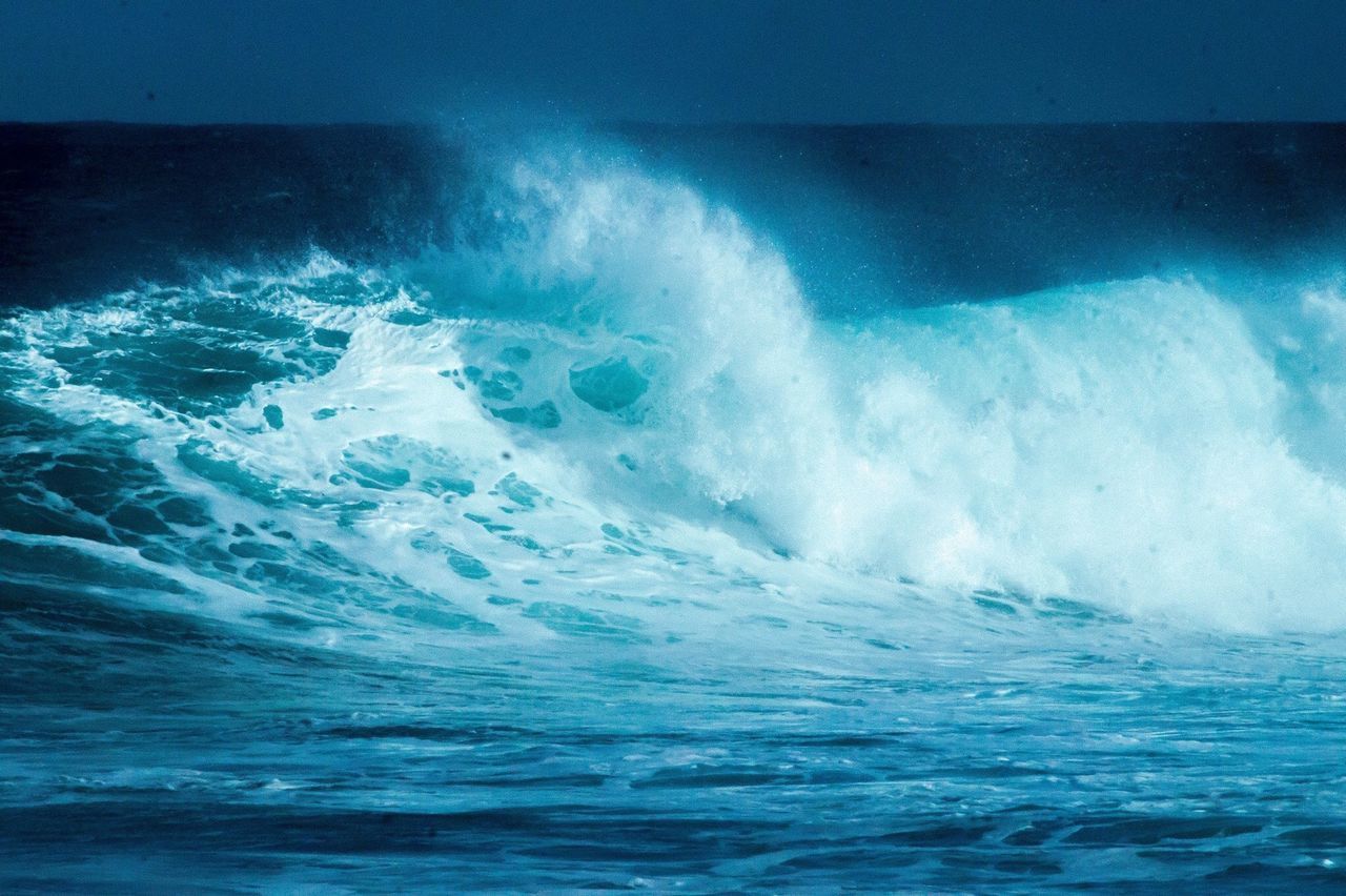 VIEW OF WAVES IN SEA