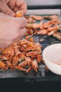 Close-up of person preparing food