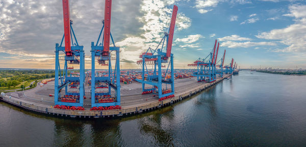 Sailboat on river against sky