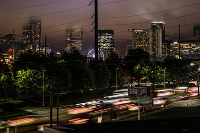 Light trails on city street at night