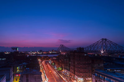 High angle view of illuminated city at night