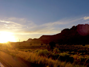 Scenic view of landscape against sky during sunset