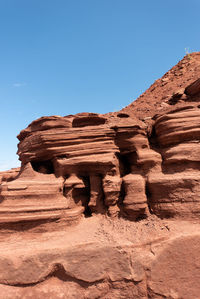 Rock formations against blue sky