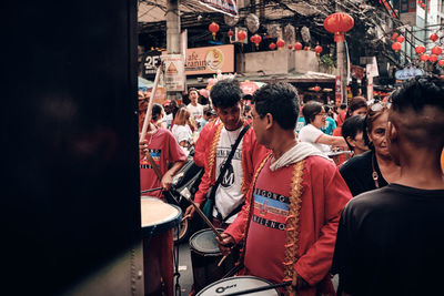 Group of people looking at city street