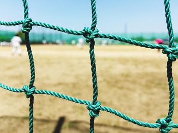 Close-up of net on playing field