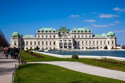 Facade of historic building against blue sky