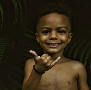 Close-up portrait of a smiling young boy