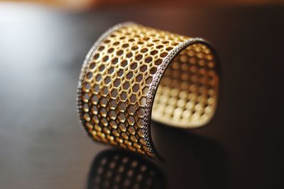 Close-up of bracelet on table