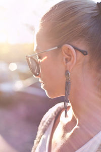 Close-up of young woman wearing sunglasses