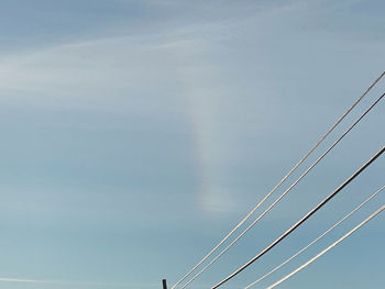 Low angle view of rainbow against sky