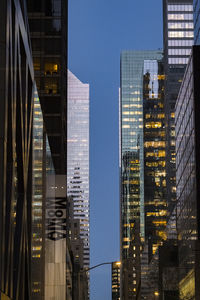 Modern buildings in city at night