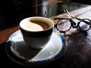 Close-up of tea cup on table