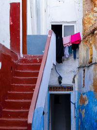 Laundry hanging in front of a window in asilah, morocco