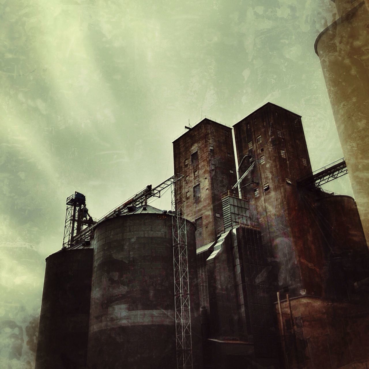 architecture, building exterior, built structure, sky, low angle view, abandoned, old, cloud - sky, damaged, deterioration, run-down, obsolete, weathered, cloudy, house, ruined, building, cloud, outdoors, no people