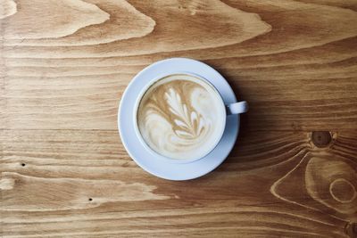 Directly above shot of cappuccino on table