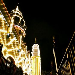 Low angle view of building against sky at night